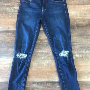 Ripped Medium Wash "Garage" Skinny Jeans size 5